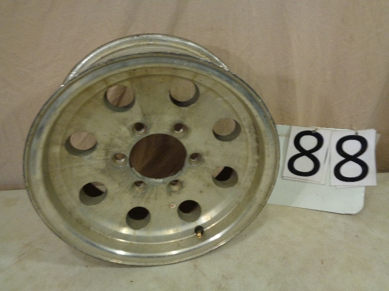 lot 88 image: 15 inch 6 Bolt Aluminum Trailer Wheel