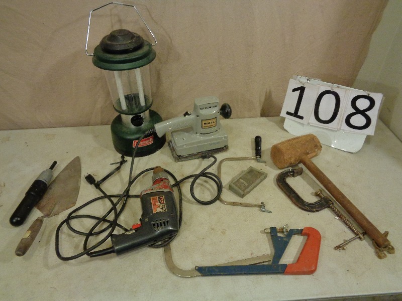 lot 108 image: Tools and Coleman Lantern