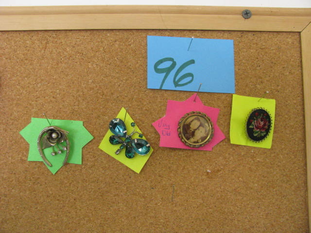 four vintage jewelry items see photos
