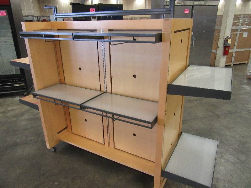 PERMASTEELISA, Commercial Display Shelf. Very light MapleBirch Veneer Surface.. Has 8 Adjustable Shelves that are metal and Plexiglass.. All different Configurations.. On Wheels.