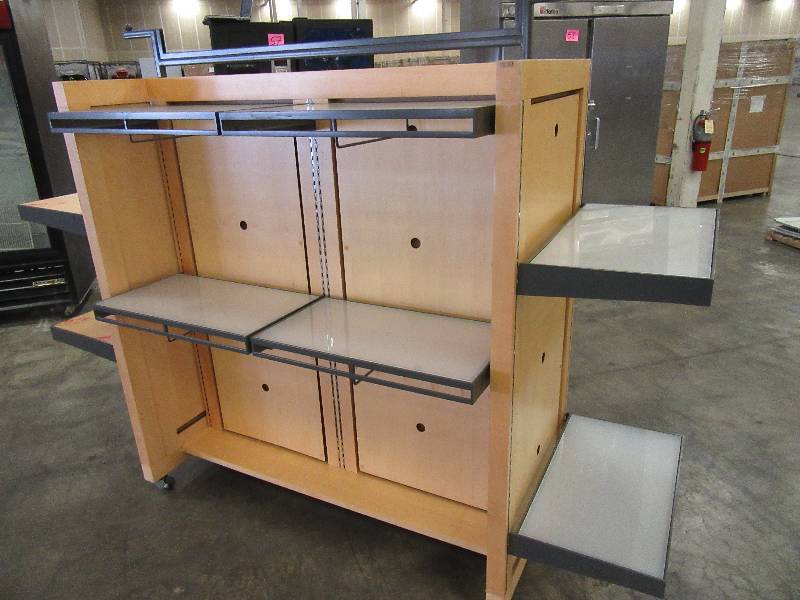 PERMASTEELISA, Commercial Display Shelf. Very light MapleBirch Veneer Surface.. Has 8 Adjustable Shelves that are metal and Plexiglass.. All different Configurations.. On Wheels.