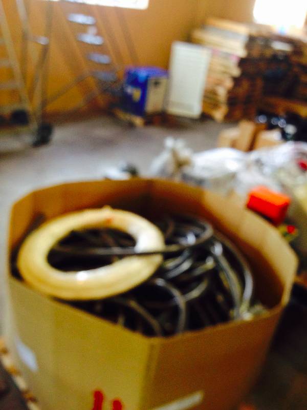 Large gaylord box of rubber hose sections