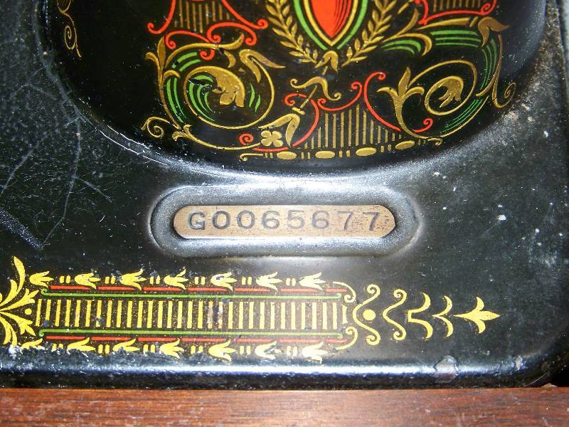 lot 1 image: Singer, Model 66, Sewing Machine in Cabinet with Drawers and Accessories - Antique  Vintage  Collectible