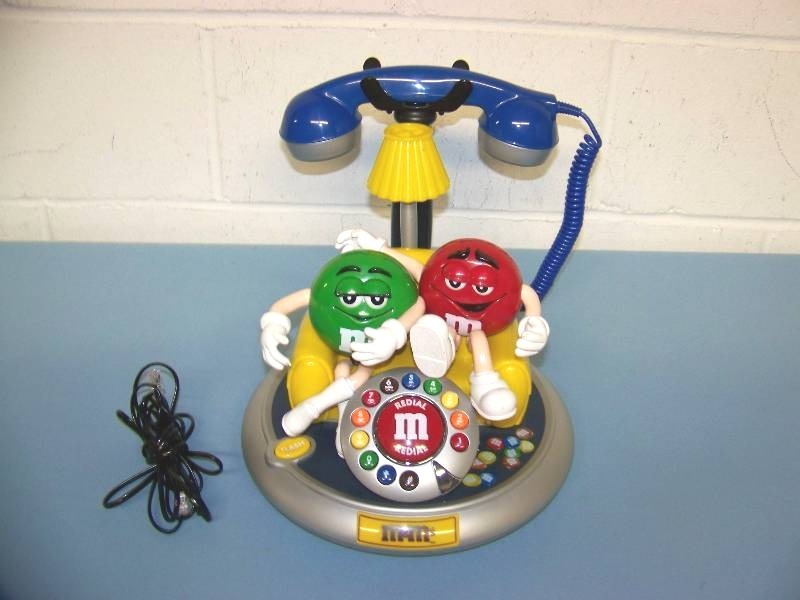 lot 38 image: M&Ms Brand, Desktop Telephone  Phone in Original Box