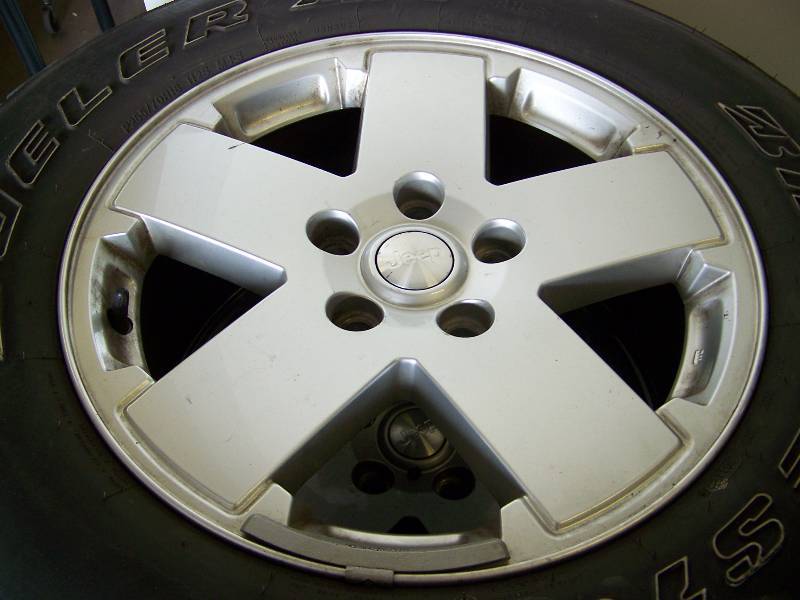 lot 46 image: Set of Five (5), Jeep Wheels  Rims from Jeep Wrangler -- Bridgestone Dueler P25570R18 Tires Included