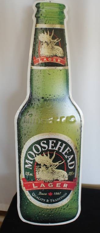 lot 39 image: Moosehead Lager Tin Tacker