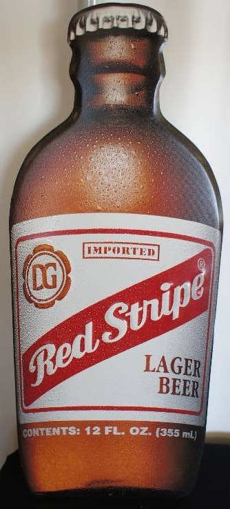 lot 40 image: Red Stripe Lager Bottle Tin