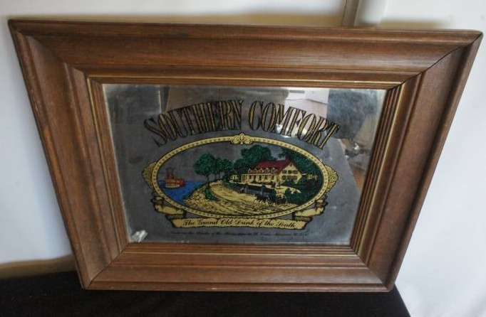 lot 143 image: Southern Comfort Mirror