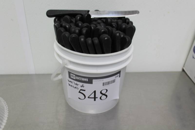 lot 548 image: Container Lot of Steak Knives wPlastic Black Handles.