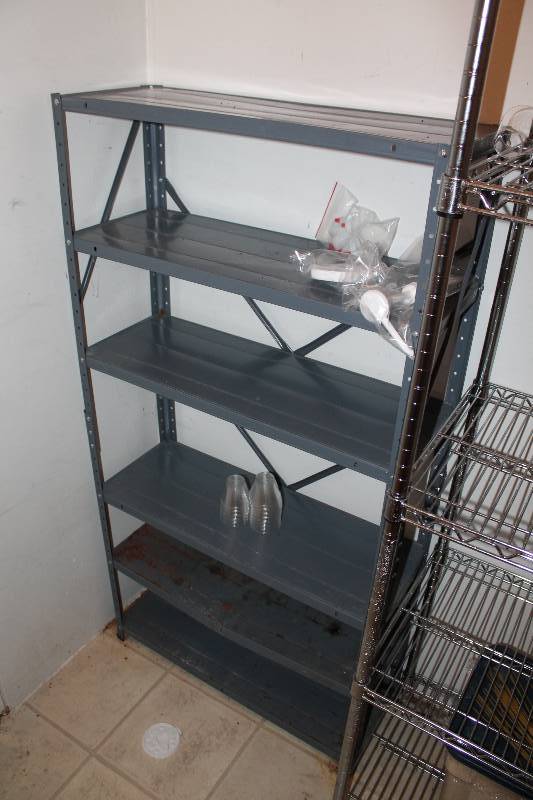 lot 653 image: Metal Shelving Unit 11 x 30 x 58.