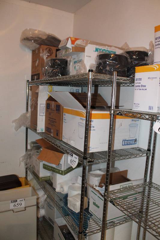 lot 660 image: Contents of Room Including Monogram Jumbo Straw Boxes Box Of Dart Clear Plastic Cups Boxes of Monogram Sheets And More.