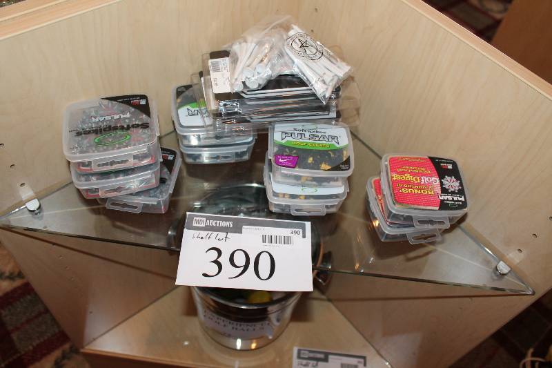 lot 390 image: Shelf Lot Including Golf Tees Pulsar Softspikes Golf Cleats Metal Cleats And More.