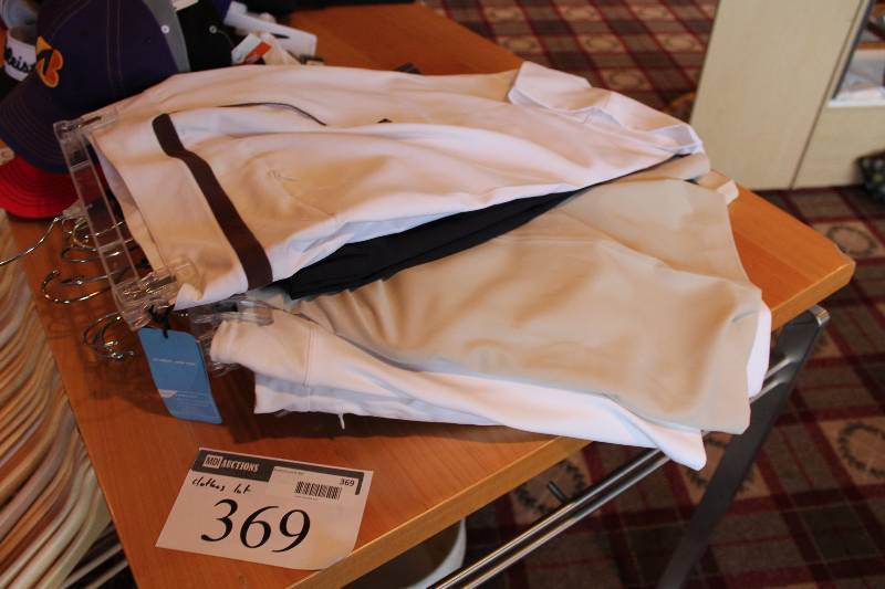 lot 369 image: Lot of Golf Shorts Striped, White, And More.