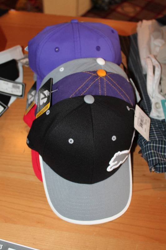 lot 372 image: Lot of (4) Golf Hats Including Brands Puma Bridgestone And More.