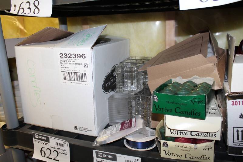 lot 639 image: Shelf Lot Including Box of Candles Glassware Glass Candle Holders Votive Candles, Multiple Colors And More.