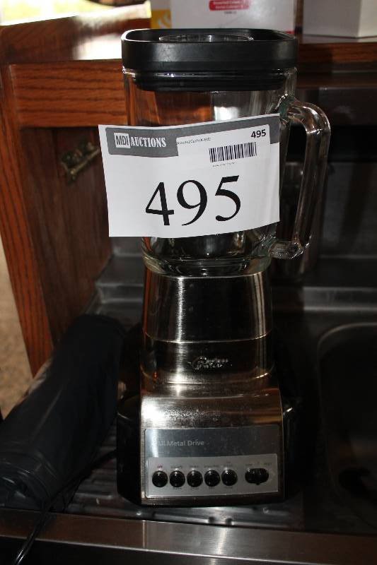 lot 495 image: Oster All-Metal Drive Blender Model GF-BCC.