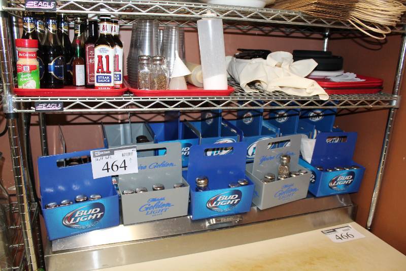 lot 464 image: Shelf Lot Including Salt & Pepper Shakers wHolders Plastic Serving Trays Condiment Bottles And More.