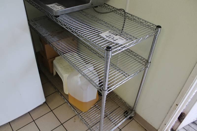 lot 404 image: Stainless Steel Metal Grate Shelving Unit w3 Shelves & Wheels Contents Not Included 18 x 48 x 41.