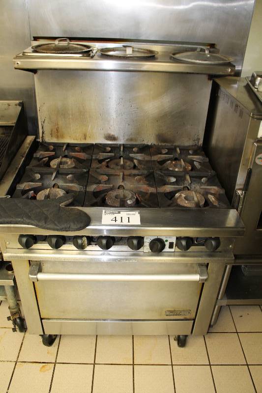 lot 411 image: Thermatek Range Corp. Gas Stove Top wLower Oven & Wheels 6 Burners Metal Inserts Individual Temperature Controls 36 x 33 x 56.