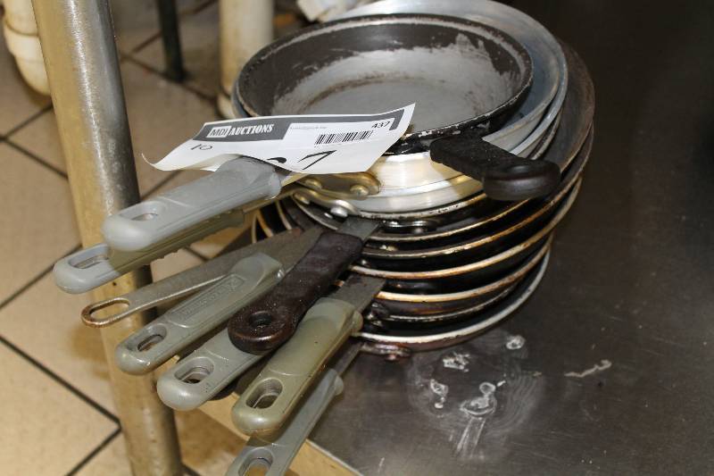 lot 437 image: Lot of (10) Metal Frying Pans wRubber Grip Handles Not All Include Rubber Grip.