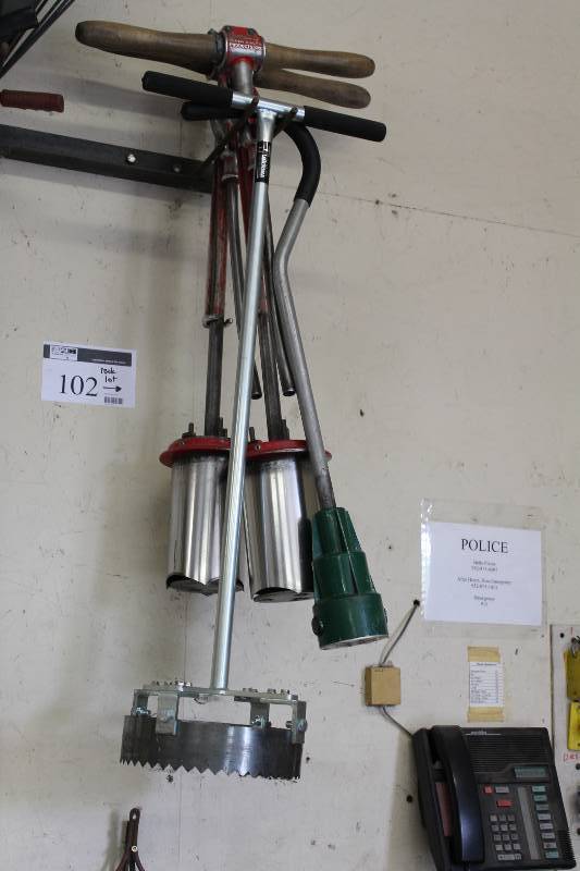 lot 102 image: Rack Lot Including Golf Hole Makers wHandle weed Sprayer And More.