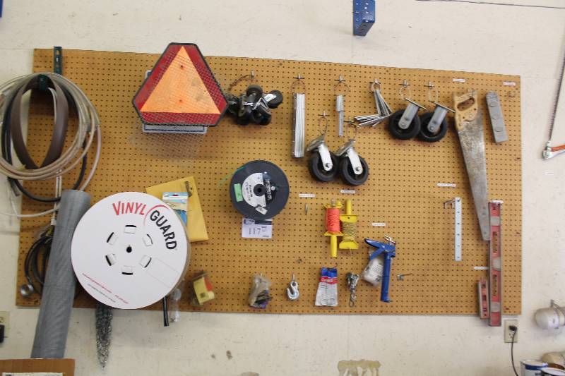 lot 117 image: Wall Lot Including Caution Sign Casters Level Saw And More.