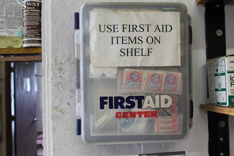 lot 126 image: First Aid Lot Including First Aid Center Wall-Mounted Kit Ice Packs And More.