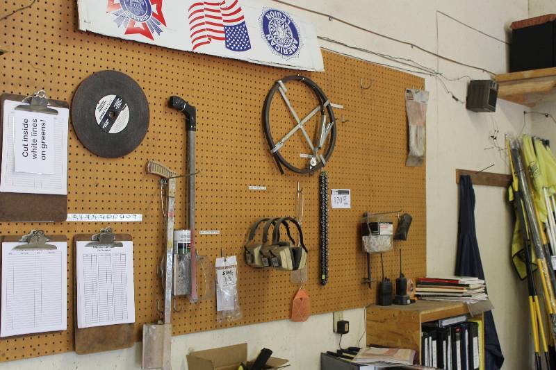 lot 120 image: Wall Lot Including Protective Ear Muffs Chain Clipboards And More.