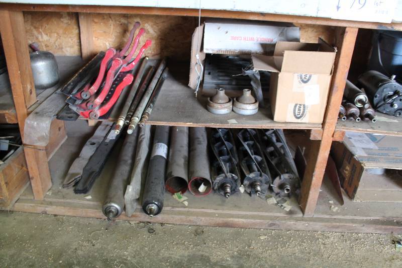 lot 79 image: Shelf Lot of (2) Including Mower Blades Grease Gun Tubes Grease Gun Nozzles Miscellaneous Metal Hardware And More.