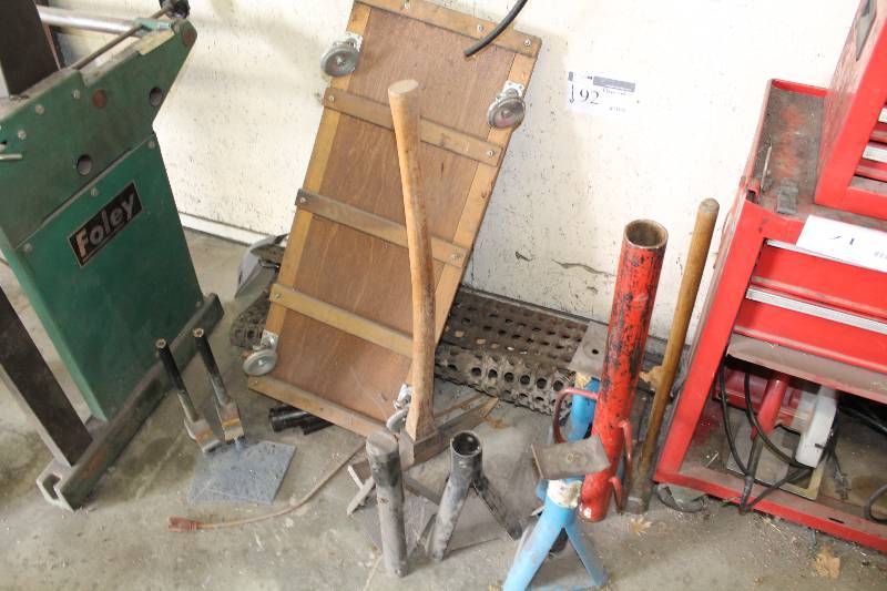 lot 92 image: Floor Lot Including Metal Jack Stands Sledge Hammer Wooden Dolly And More.