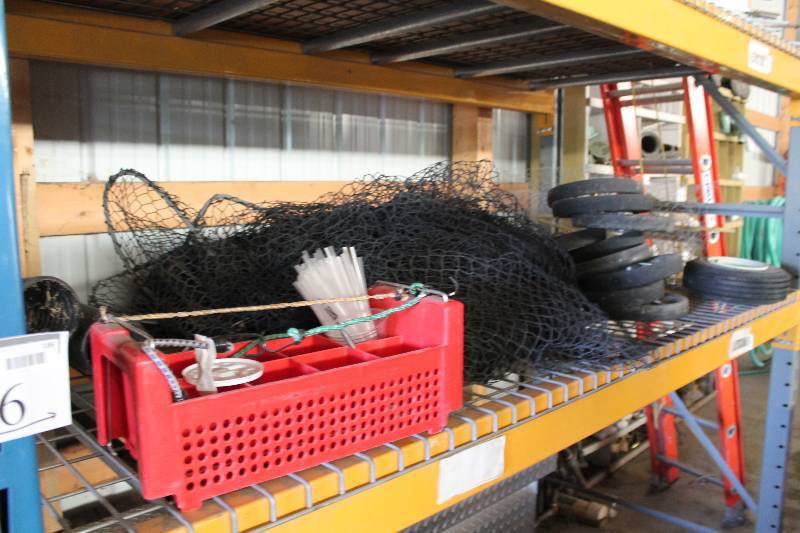 lot 186 image: Shelf Lot Including Plastic Beverage Holder Plastic Buckets Mesh Netting, Black And More.