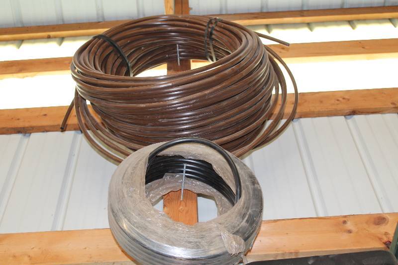 lot 195 image: Lot of (2) Rolls Of Rubber Hose BrownBlack.
