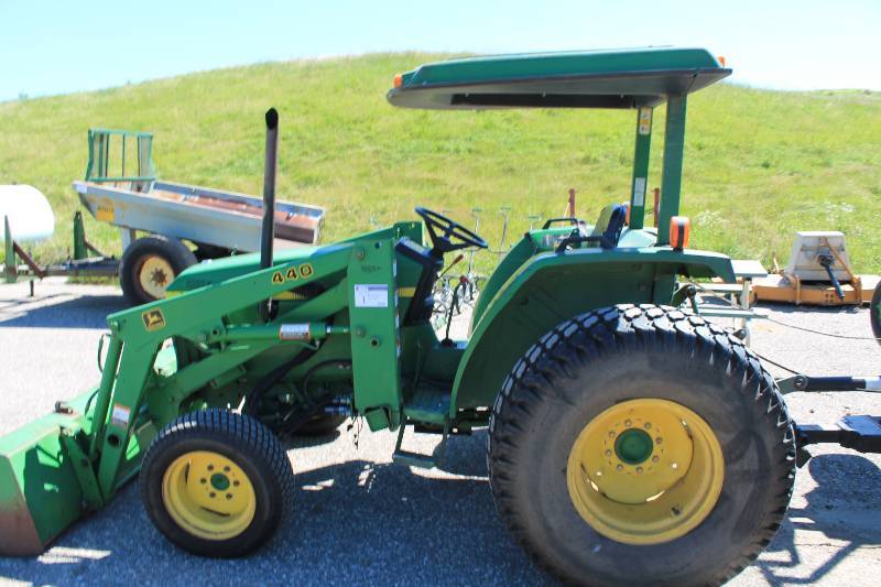 lot 1 image: John Deere 1070 Wheeled Harvester Tractor wFront Bucket Attachment & Overhead Awning 7875 Hours Tested & Operational.