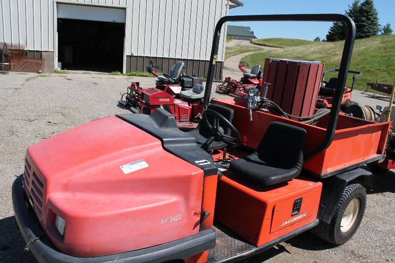 lot 3 image: Jacobsen SV 3422 Tractor & Grounds Maintenance Vehicle Red Bucket Loader wHydraulic Lift Dual Seats & Steering Wheel Tires wRims Tested & Operational Trailer Sold Seperately.