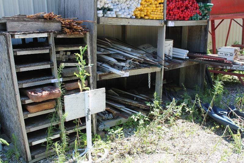 lot 48 image: Shelf Lot Including Wooden Markers Wooden Signs Plastic Bucket And More.