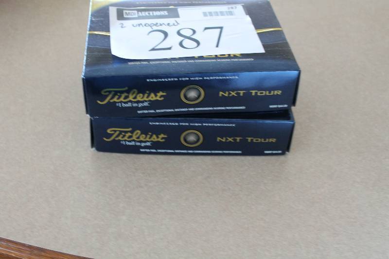 lot 287 image: Case Lot of (2) Titleist NXT Tour Golf Balls.