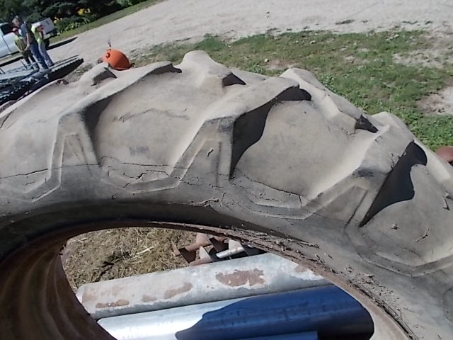 lot 40 image: Farmall M Rim & Tire, 13.6 x 38...