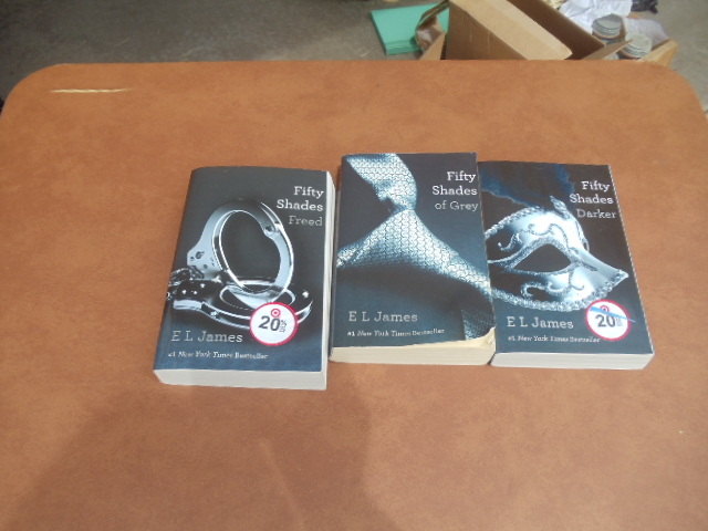 lot 44 image: Fifty Shades of Grey Books