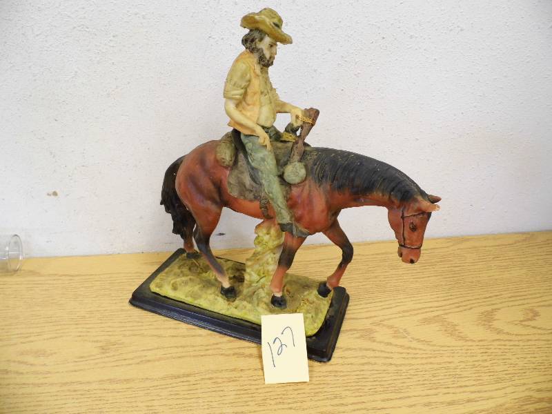 Resin Cowboy on Horse Statue