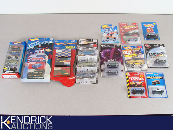 lot 68 image: 23 Vintage MINT ON CARD Hot Wheels, Tonka, and Tootsie Toy Cars