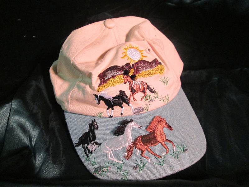 Hat with Blue Bill, Horses on a Pla...