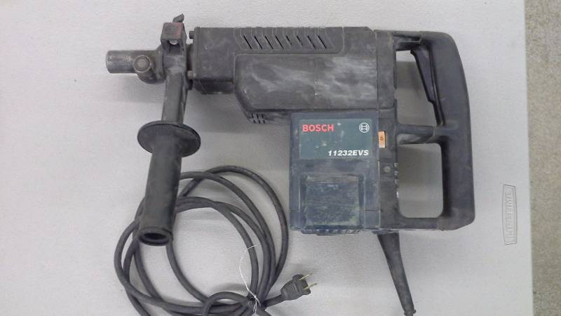 lot 65 image: Bosch 11232EVS Hammer Drill (1)