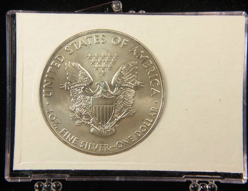 2014 US SILVER EAGLE .999 FINE SILVER IN PATRIOTIC HOLDER