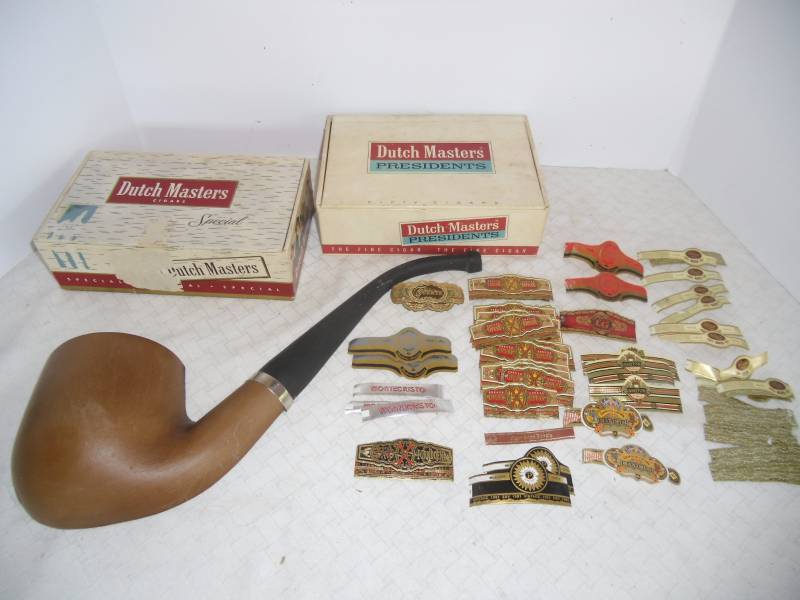lot 34 image: Cuban Cigar Labels and Metal Wall Tobacco Pipe