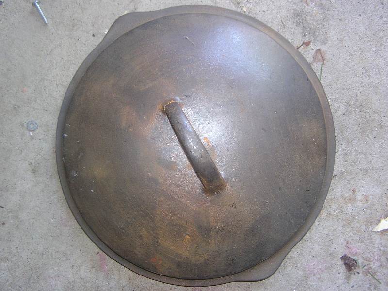 lot 104 image: cast iron lid #9 or #10 not sure