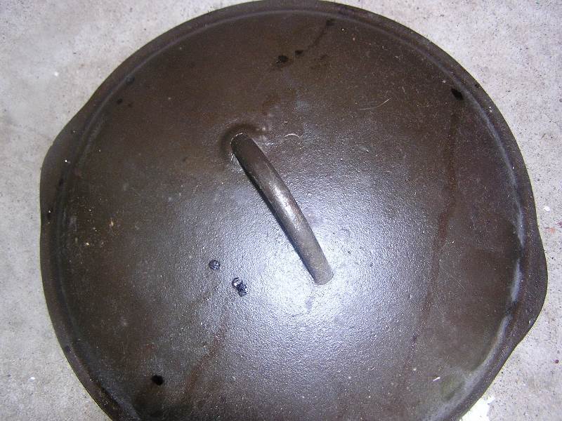 lot 105 image: cast iron lid #8