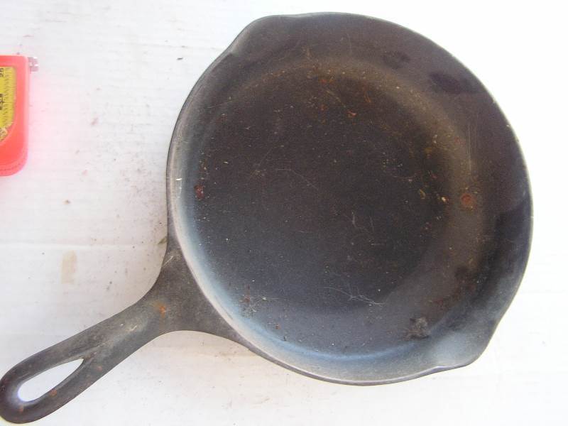lot 169 image: wagner national cast iron skillet 1357