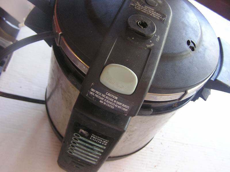 lot 185 image: cooks essentials electric pressure cooker (issues)