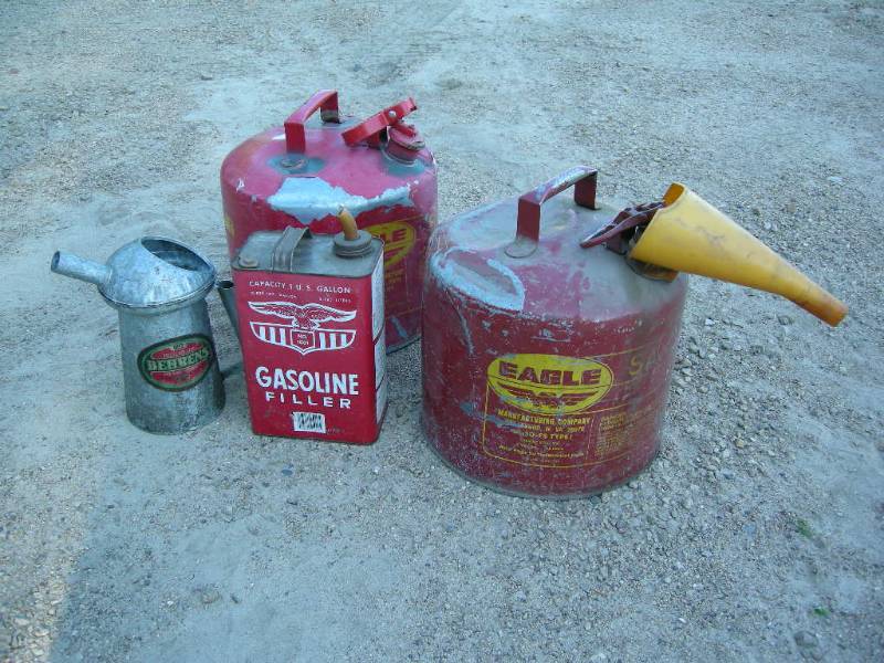 lot 16 image: Vintage GasOil cans