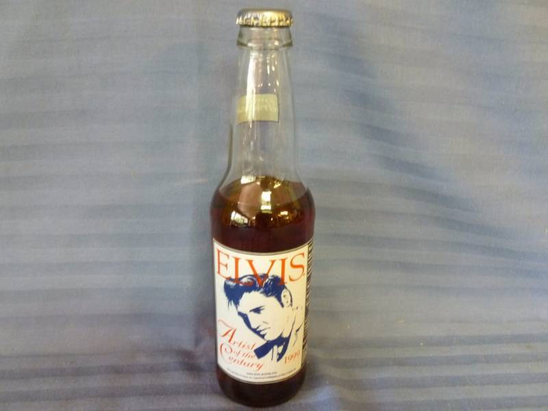 lot 45 image: Collectible Elvis Bottle